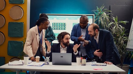 Tired overworked employee deciding to quit his job during important meeting, getting sick of being...