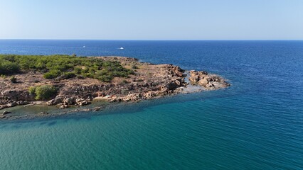 Idyllic View of Remote Beachfront and Tranquil Waters