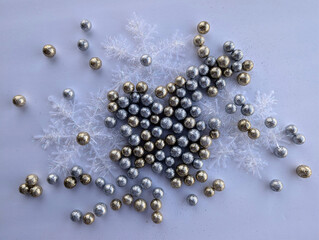 Snowflakes and small shiny balls for Christmas decoration