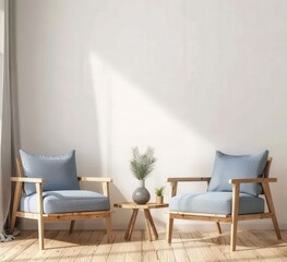 Two blue armchairs with wooden frames and cushions. facing each other. a small table with a vase and green plant in between