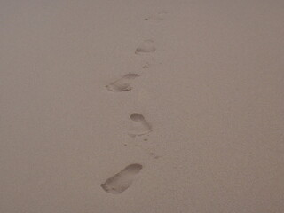 footprints on the beach