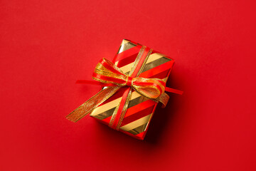 Christmas gift box on red background