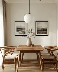 Minimalist Dining Room with Wooden Furniture and Neutral Decor Featuring a Wooden Table, Wooden Chairs, a White Vase with Branches, and Framed Black and White Landscape Photographs.