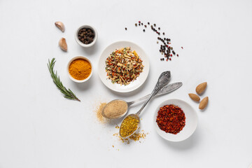 Composition with fresh aromatic spices on grey background