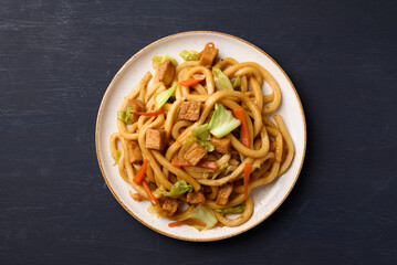 Yaki Udon, Stir fried udon noodles with tofu, carrot, cabbage and mushroom, Japanese cuisine, Asian...