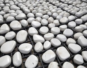 Fototapeta premium Large, smooth white stones displayed through a steel grate , decor, stones, material
