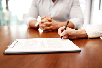 Hands, business people and signature on document at office for partnership, deal and contract agreement. Closeup, pen and legal paperwork for policy compliance, employment conduct and onboarding