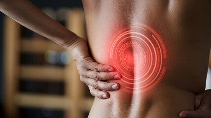close up photo of a person holding a sore back