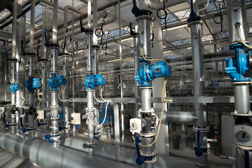 Heating and water supply system for greenhouses. Steel pipe framework with thermostats regulating...