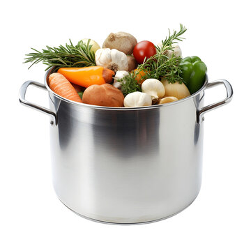 A large silver pot filled with a variety of vegetables including carrots