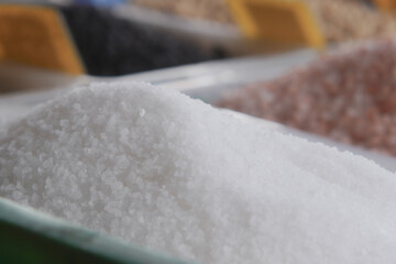 A Wide Variety of Sugars and Salts is Presented in the Market Display
