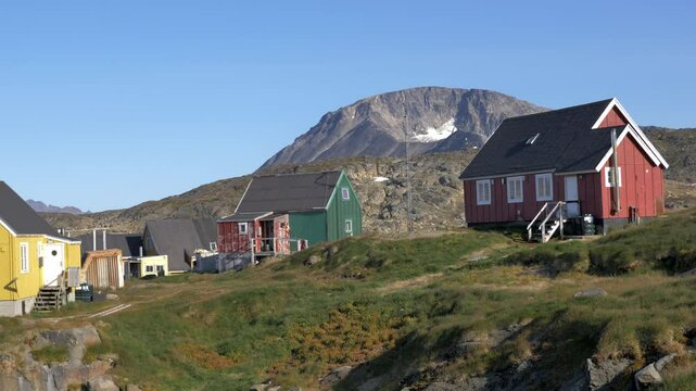 Typical colourful nordic houses, filmed in a sunny day in Kulusuk, a remote settlement in Eastern Greenland. Similar footage available in my portfolio.