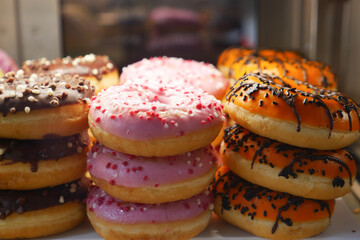 chocolate donuts display for sale at local store 