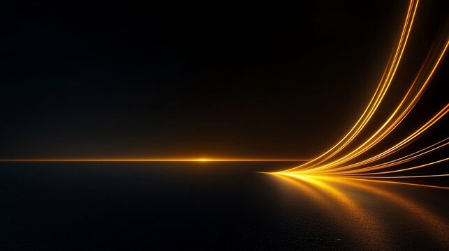 Abstract golden light streaks on dark background.