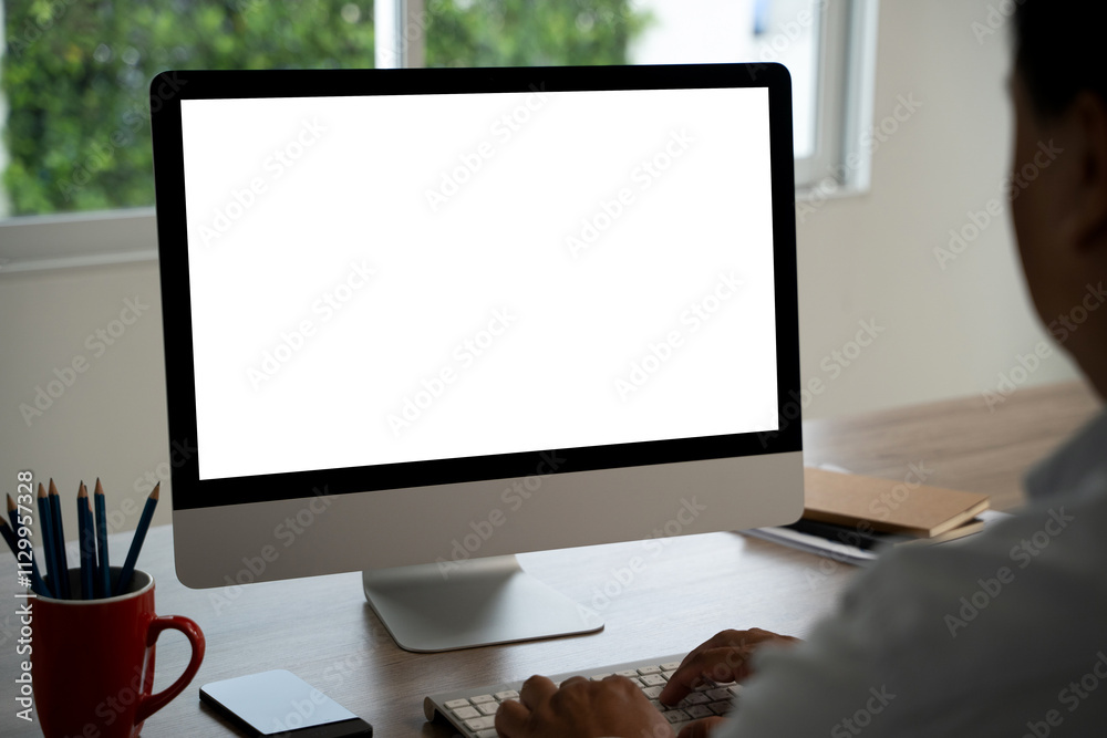 Poster man working businessman using a desktop computer of the blank screen with hands