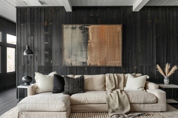 Farmhouse country-style modern living room with a beige sofa, black wooden wall, and textured accents creating a cozy and sophisticated interior design