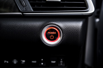 Close up engine car start button. Start stop engine modern new car button,Makes it easy to turn...