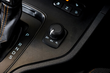 Fototapeta premium Close up engine car start button. Start stop engine modern new car button,Makes it easy to turn your auto mobile on and off. a key fob unique ,selective focus