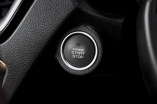Close up engine car start button. Start stop engine modern new car button,Makes it easy to turn your auto mobile on and off. a key fob unique ,selective focus - Powered by Adobe