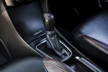 automatic transmission shift selector in the car interior. Closeup a manual shift of modern car...