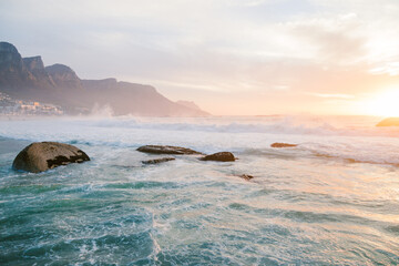 sunset on the beach waves crashing