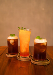 Iced tea with lemon and fresh orange ice