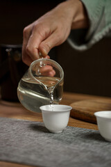 Enjoy the experience of elegant tea pouring in a beautifully designed, modern setting