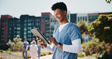 Happy man, nurse and research with tablet for internship, med school or healthcare course at...