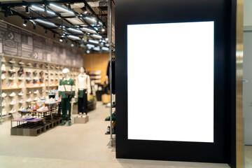 Mockup blank vertical billboard advertising at front of sport shoes store