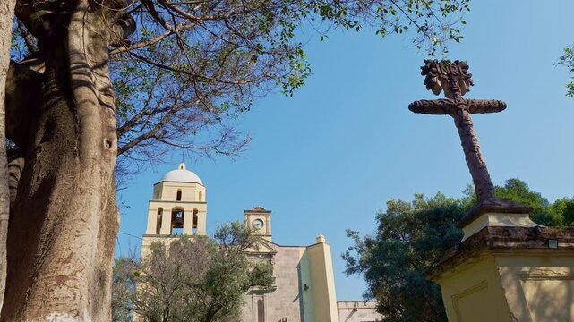  Temple and ex-monastery of the Divino Salvador and stone cross in the town of Malinalco, State of Mexico, Mexico.  4K video