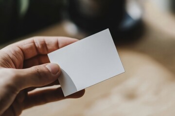 Obraz premium Business card displaying personal information office environment promotional material close-up view professional networking concept essential for business growth