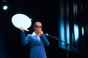 Woman Holding Speech Bubble Covering her Mouth on Stage. Person suffering from stage fright unable...