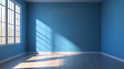 Obraz premium Bright blue wall in an empty living room featuring natural light and wooden flooring ideal for interior design inspiration and decoration ideas