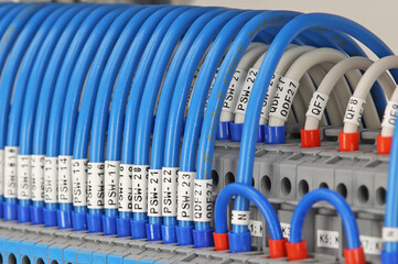 Marking of electrical wires using thermal printing on vinyl tape.