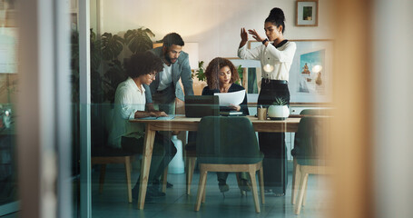 Laptop, planning and business people in meeting, teamwork and communication in modern office....