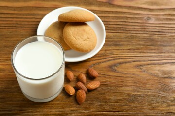 Glass of almond milk on the table 