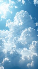 Fototapeta premium A serene sky filled with fluffy white clouds against a bright blue backdrop.