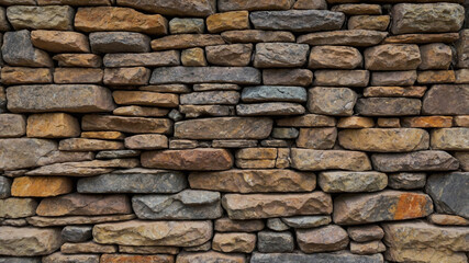 Obraz premium Textured Stone Wall Masonry Surface for Rustic and Modern Architecture Design