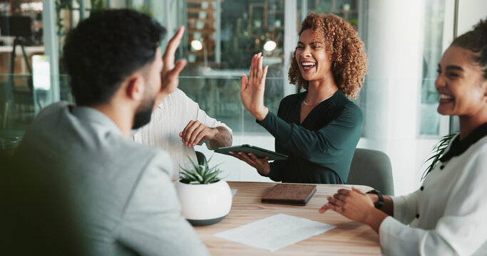 Women, high five and tablet at meeting, success and happy with congratulations, goals and diversity at startup. People, group and teamwork with celebration, cheers or achievement at creative agency - Powered by Adobe