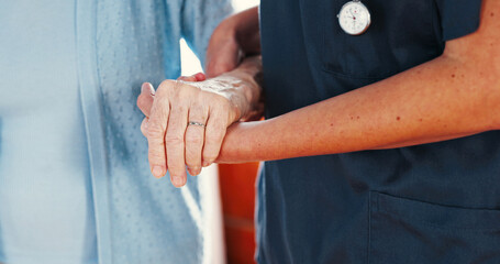 Holding hands, support and medical nurse with old person for healthcare, caregiver and empathy....