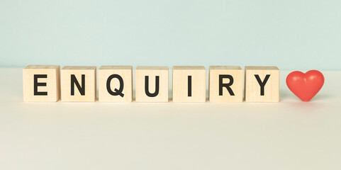 enquiry - cube with letters, sign with wooden cubes