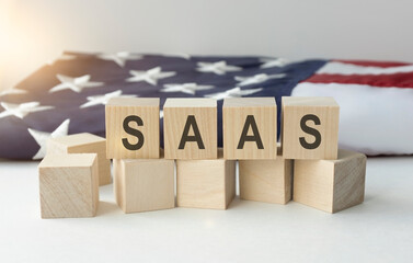 SAAS text on wooden cubes on white background - Image