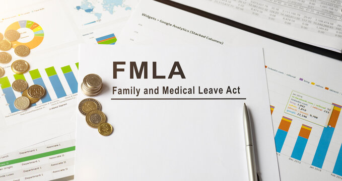FMLA Family Medical Leave Act and a book.