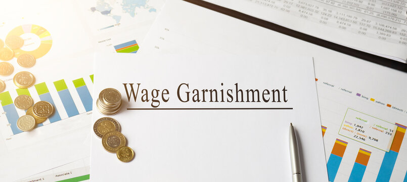 Paper with Wage Garnishment on a table