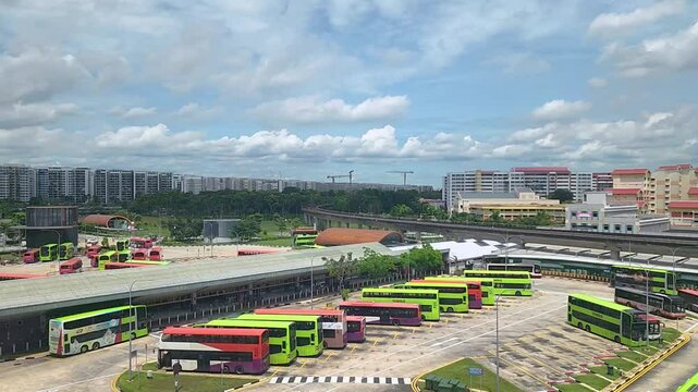 Daytime of Tampines Bus interchange. 4K resolution time-lapse of the Singapore skyline at night.