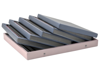 Set of photo albums in a pink storage box isolated with transparent background