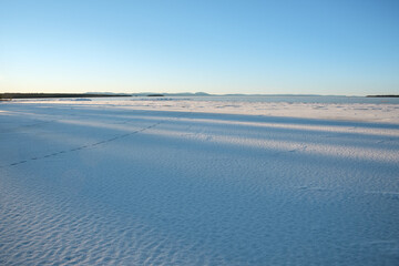 Winter landscape of snow-covered fields in Leksand, Dalarna, Sweden