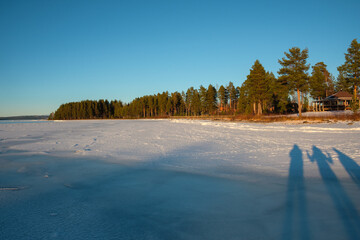 Winter tranquility along the icy shore of Leksand in Dalarna, Sweden