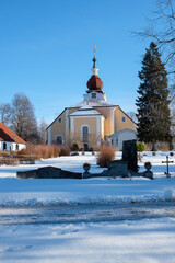 Beautiful winter landscape in Leksand, Dalarna with snow-covered church and serene surroundings