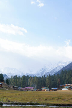 Snowy Nanga Parbat reflects perfectly in a calm lake at Fairy Meadows, Pakistan. 